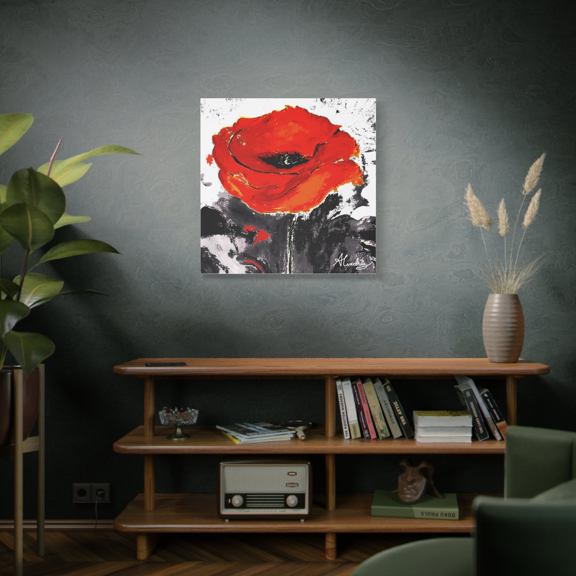 bright red poppy painting hanging in an eclectic room 